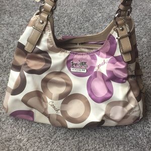 Tan and purple coach purse